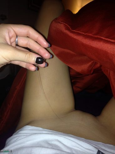 Amateur girl showing sticky pussy string out of her vagina