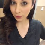 Selfie made by a sexy nurse in the hospital with her work outfit