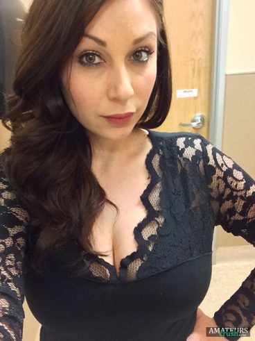 selfie of sexy nurse wife in her black longsleeve in the hospital