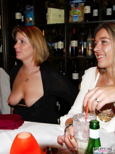 milf having one boob out in public restaurant