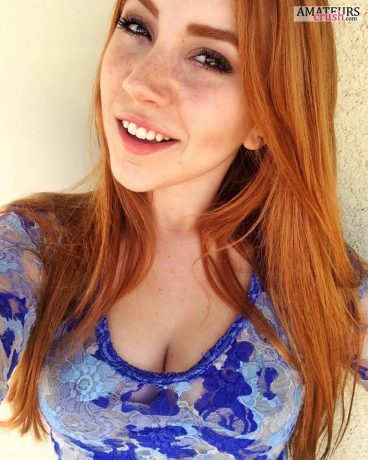 beautiful natural redhead selfie in her blue shirt