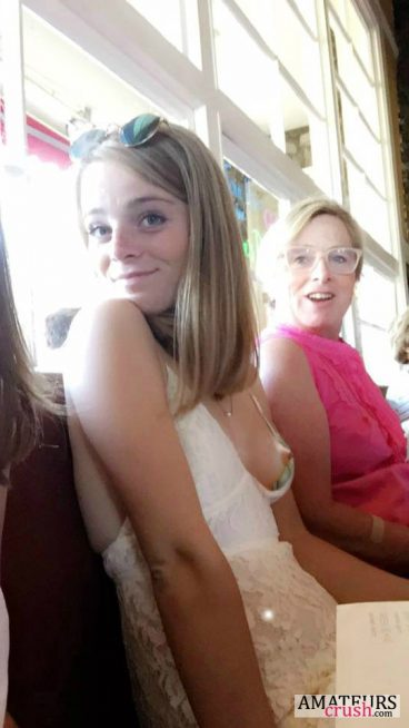 Teenage girl having a nip slip or public flash with her mum