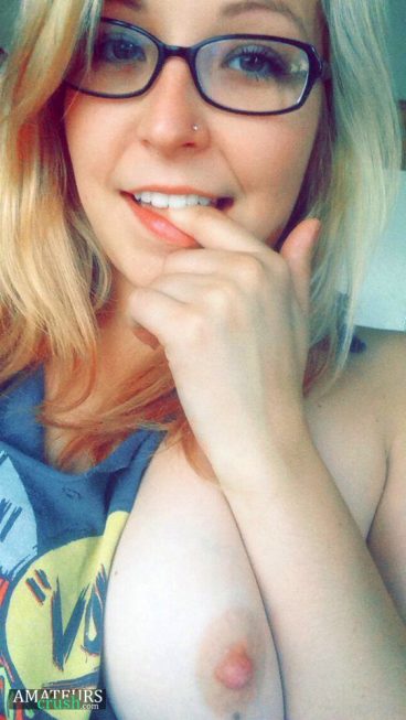 One boob out of horny MILF with glasses
