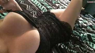 Hot teasing tits out dress pic of busty amateur lying on bed
