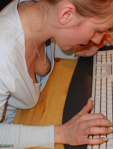 Unaware braless wife gets her picture taken while her boobs are showing in her shirt