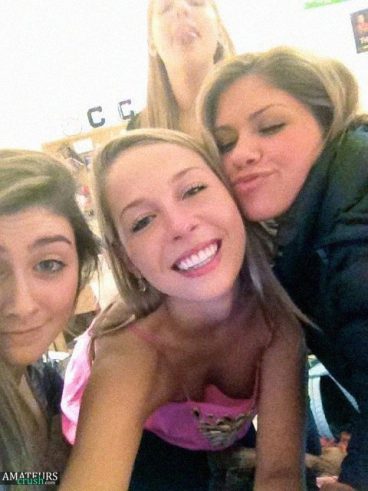 Sexy teen downblouse peek in group selfie of wardrobe malfunction showing her sexy oops tits