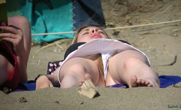 Hairy pussy slip on beach while tanning pic