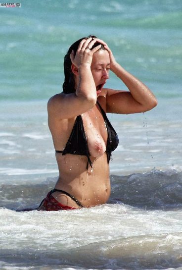 Boob out in rough waters at sea in bra malfunction
