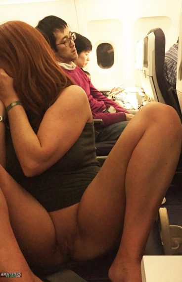 Sexy Asian pussy flashing in public on plane