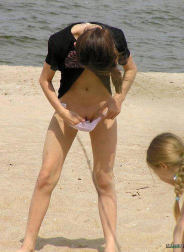 Beautiful camel toe beach of bald vagina slip