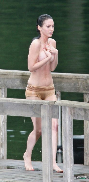 Old naked pictures of Megan Fox covering her tits all wet out of water