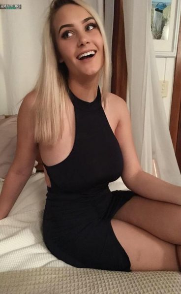 Private amateur photo of busty amateur Aussie girl in black dress