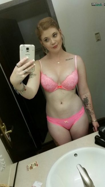 Very sexy natural red head girl in pink lingerie