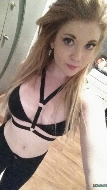 Hot real ginger girl in black sporty outfit