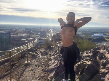 Beautiful view during hiking of sexy girlfriend flashing her tits at the top