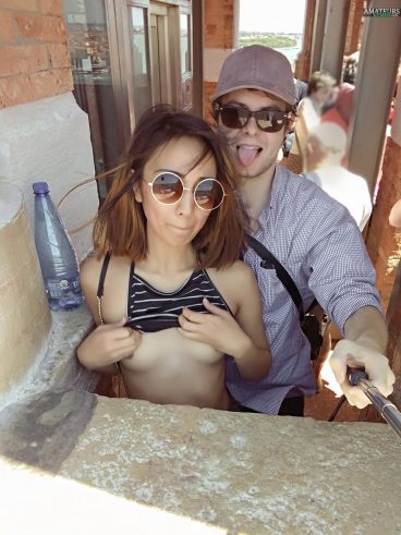 Girlfriend flashing her tits in public selfie