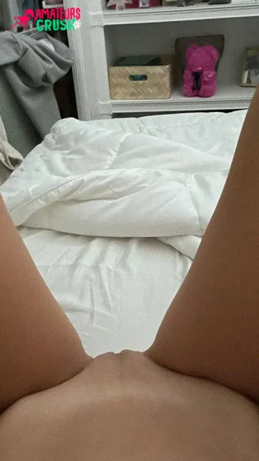 hot college teen pussy exposed selfshot on bed between her legs