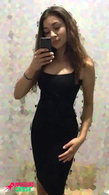 young 18+ Latina teen amateur sexy black dress dressingroom selfie